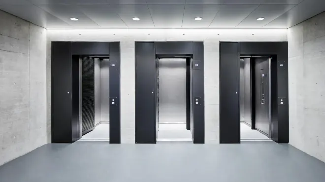 Elevator lobby with three lifts